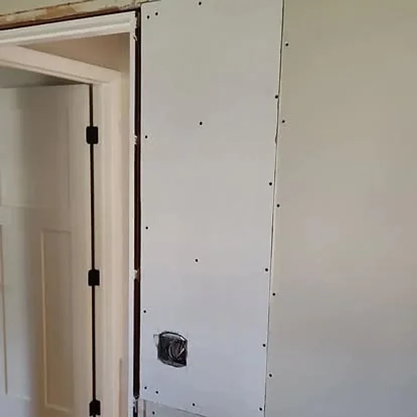 Wallboard fitted during an interior doorway repair